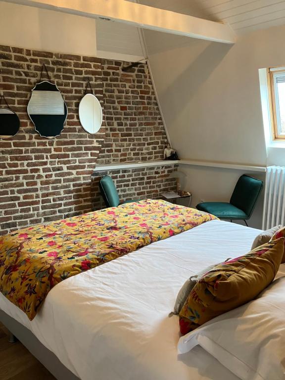 Postel nebo postele na pokoji v ubytování Chambres avec Vue