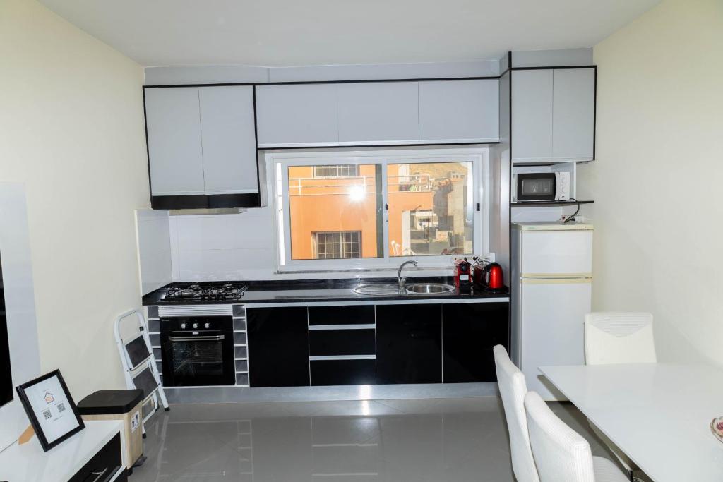 Кухня или мини-кухня в Cidadela Apartment

