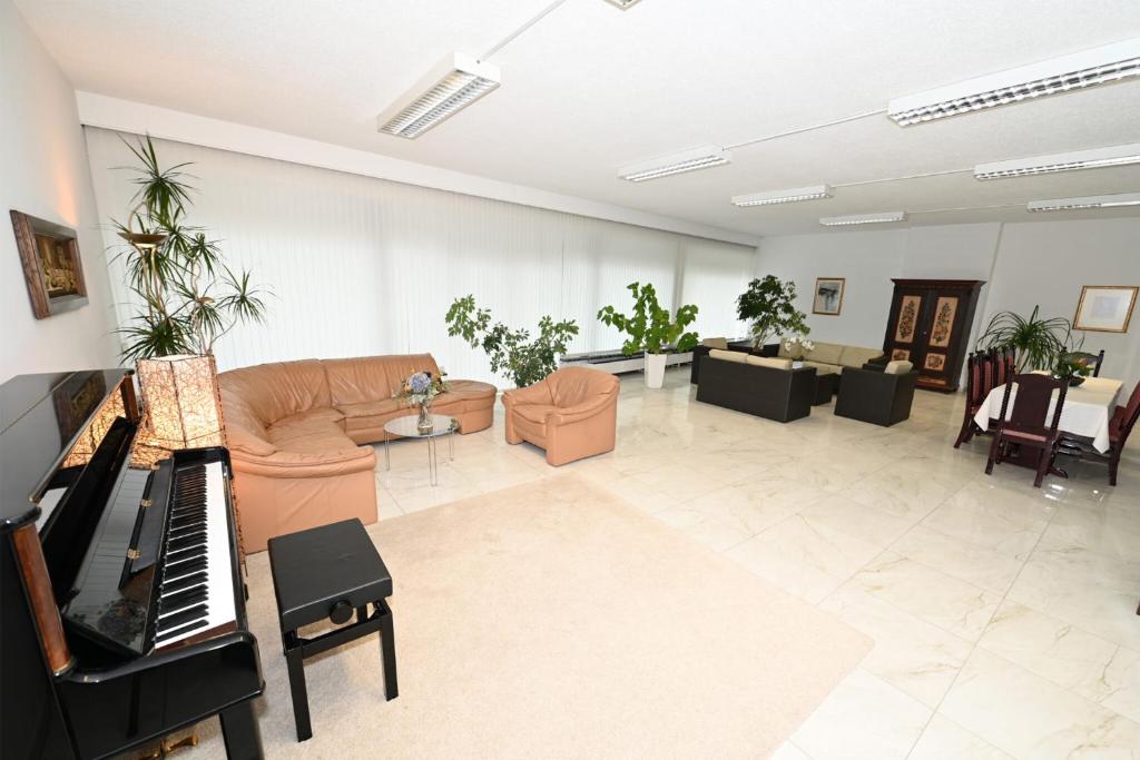 Posezení v ubytování Pension & Apartments Ertl