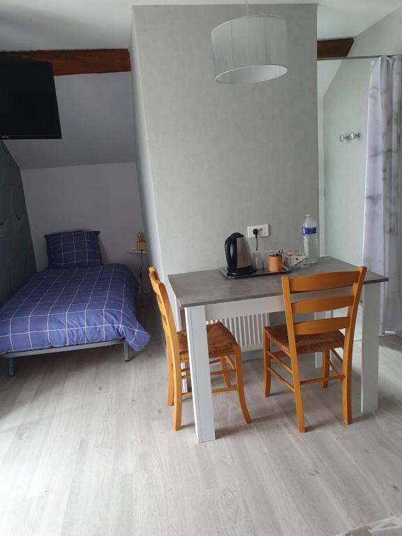 Postel nebo postele na pokoji v ubytování Vallée du Serein