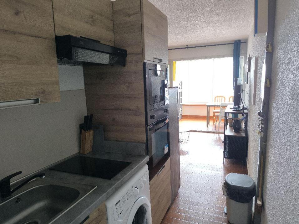 Kuchyňa alebo kuchynka v ubytovaní Appartement de vacances - Splendide vue sur mer, Parking privé