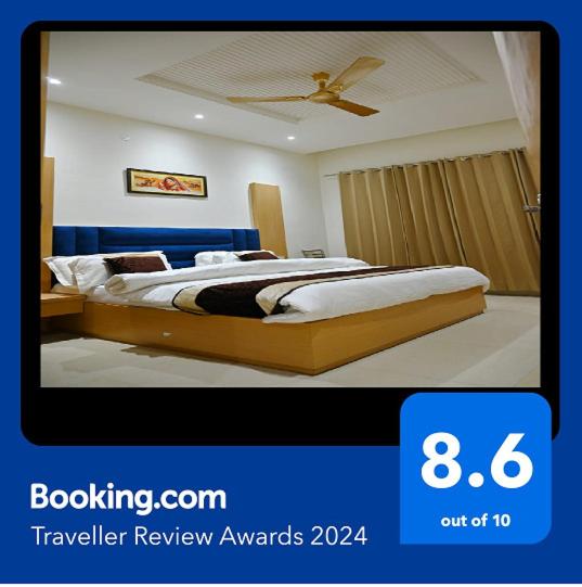 a picture of a hotel room with a bed at KOZZY B&B in Amritsar