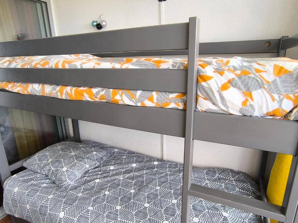 Posteľ alebo postele v izbe v ubytovaní Appartement de vacances - Splendide vue sur mer, Parking privé