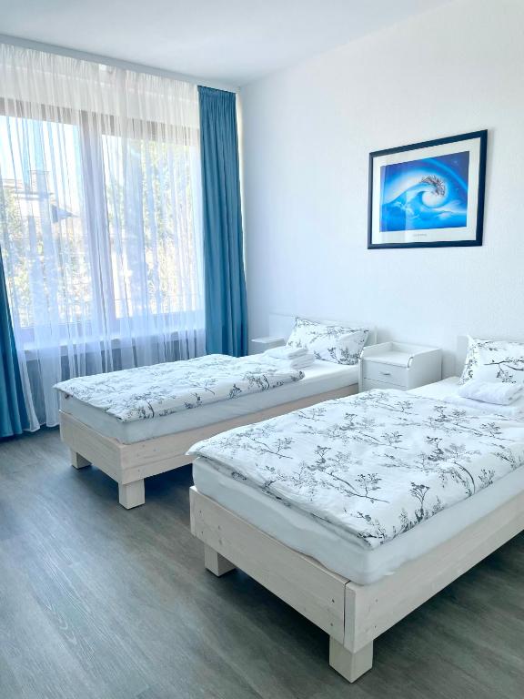 Postel nebo postele na pokoji v ubytování Stay Westend