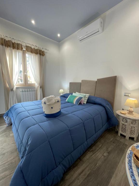 A bed or beds in a room at Dimora Bellini