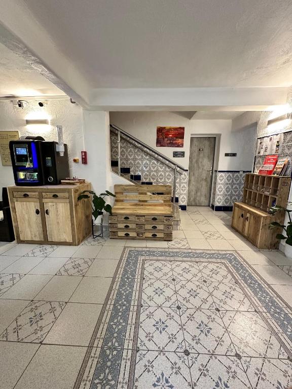 Kuchyň nebo kuchyňský kout v ubytování Hotel Les Palmiers En Camargue