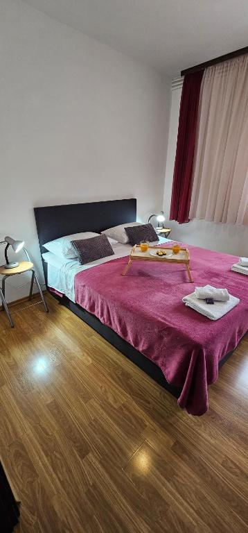 Postel nebo postele na pokoji v ubytování Apartman Pida