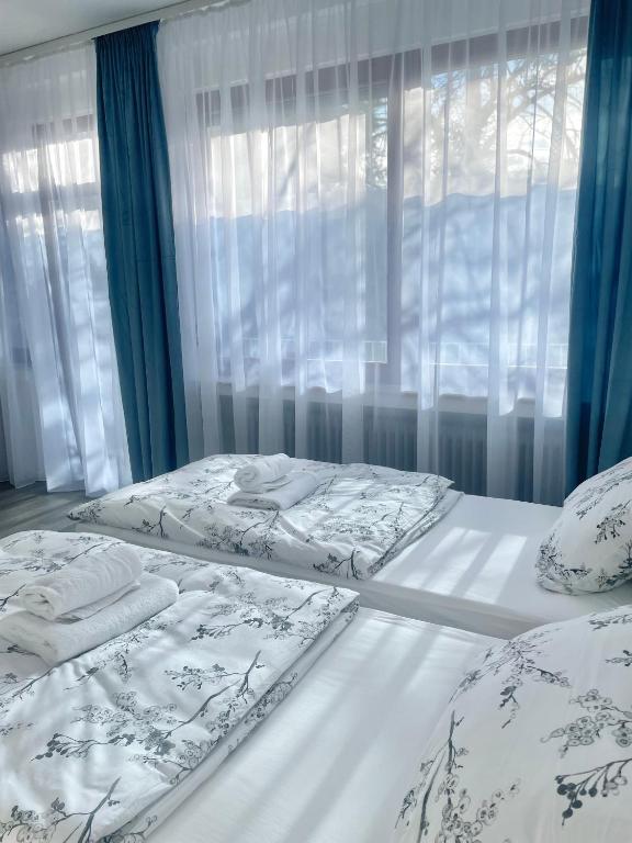 Postel nebo postele na pokoji v ubytování Stay Westend