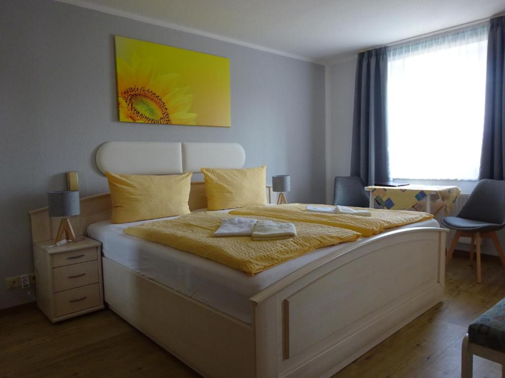 Postel nebo postele na pokoji v ubytování Pension Sigwarth