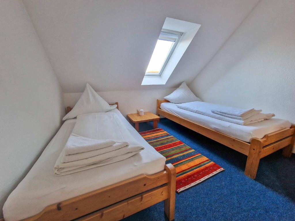 Postel nebo postele na pokoji v ubytování Frisia