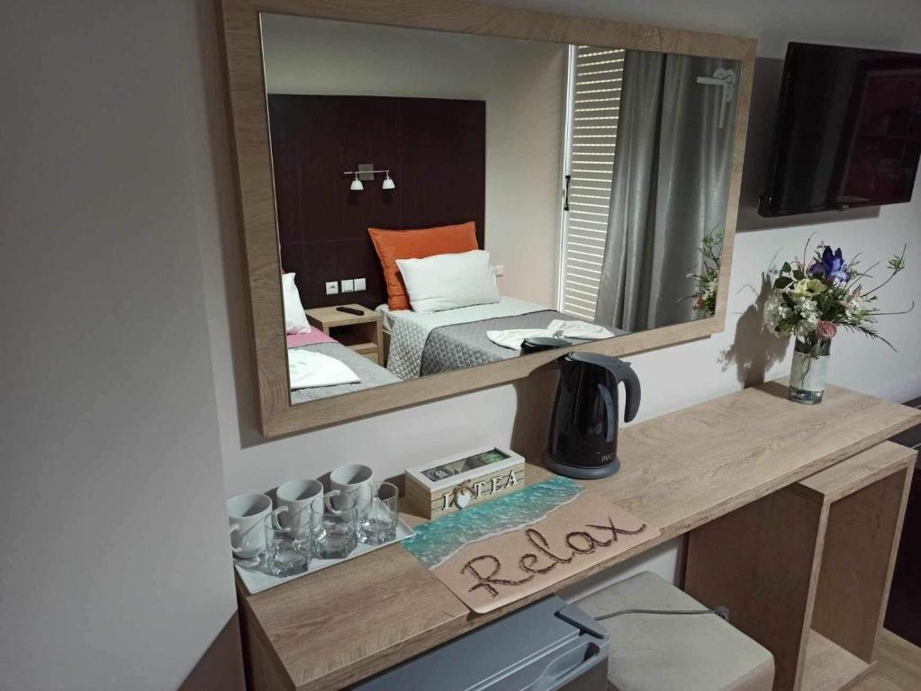 Kuchyň nebo kuchyňský kout v ubytování George Hotel Rooms&Suites