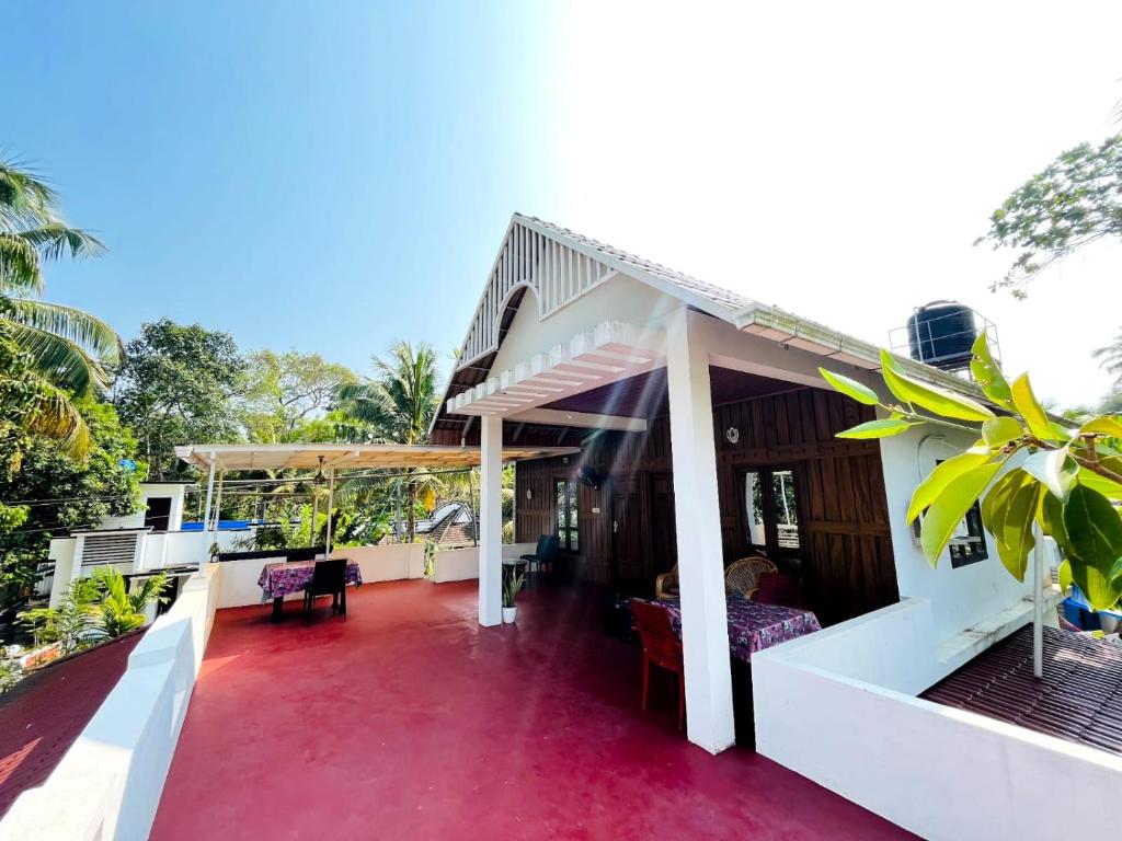 a view of the front porch of a house at Marari Oceanscape in Alleppey