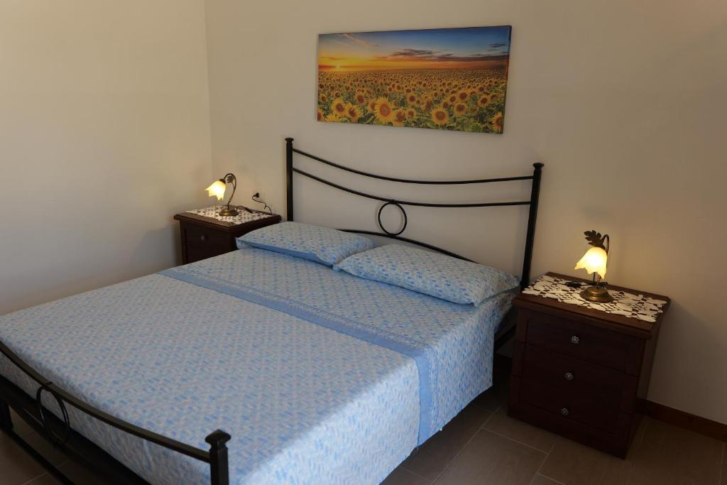 Postel nebo postele na pokoji v ubytování Agriturismo Masseria San Basilio