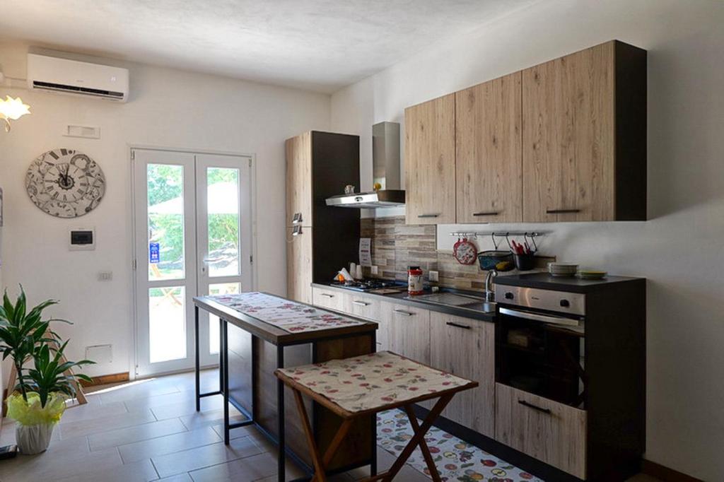 Kuchyň nebo kuchyňský kout v ubytování Agriturismo Masseria San Basilio