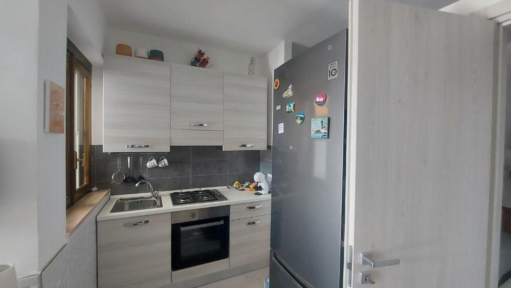Kuchyň nebo kuchyňský kout v ubytování Casa Neve al mare