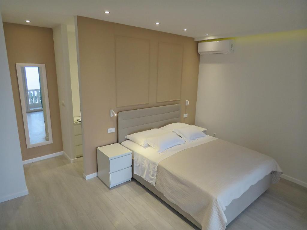 Posteľ alebo postele v izbe v ubytovaní Apartment Esperansa