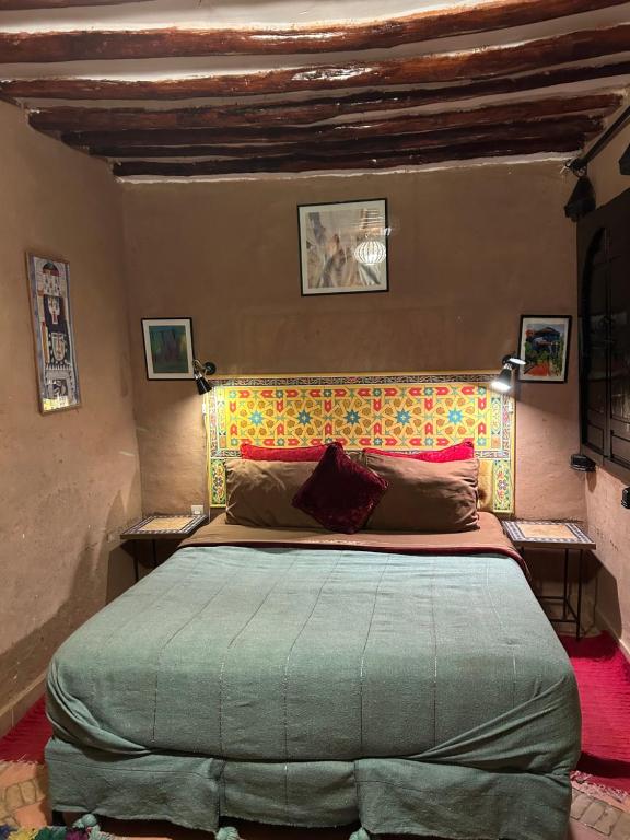 Postel nebo postele na pokoji v ubytování Riad N10
