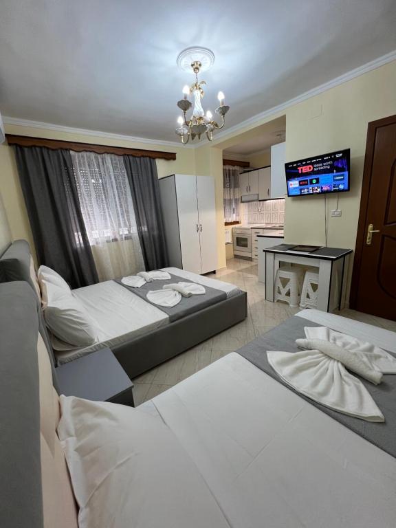 Postel nebo postele na pokoji v ubytování Sota Apartment