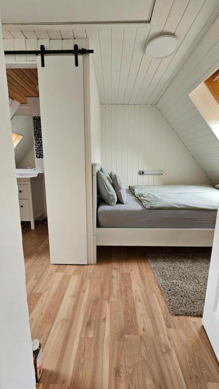 a bedroom with a bed in a attic at Träumerei Veitsch in Veitsch
