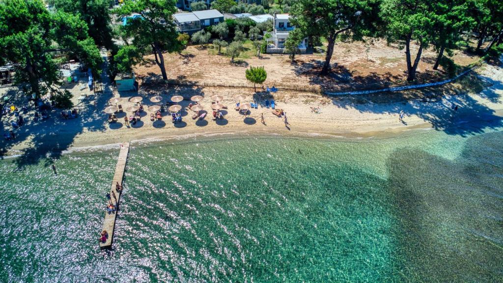 an aerial view of a beach with a group of people at VILLA KASABLANCA in Skala Rachoniou