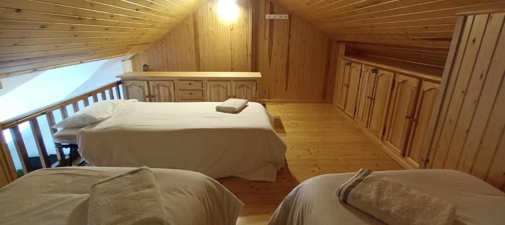 Postel nebo postele na pokoji v ubytování El Ático Nuevo en el centro con ascensor, garaje, aire acondicionado y WiFi