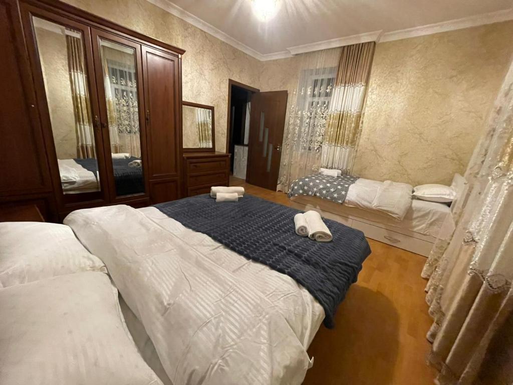 Postel nebo postele na pokoji v ubytování Hotel Tsiskari