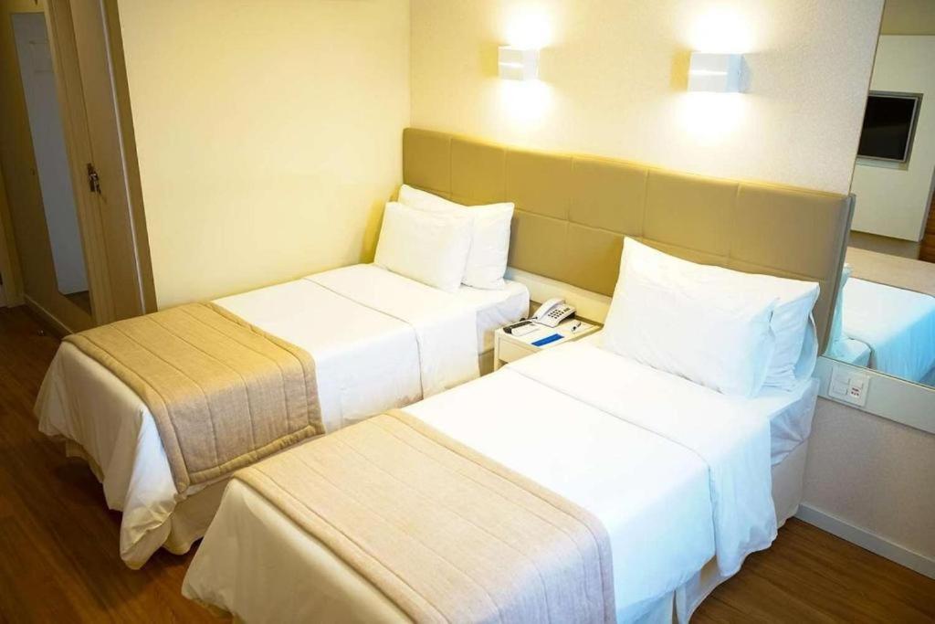 Cama o camas de una habitación en QUARTO DUPLO - Suíte