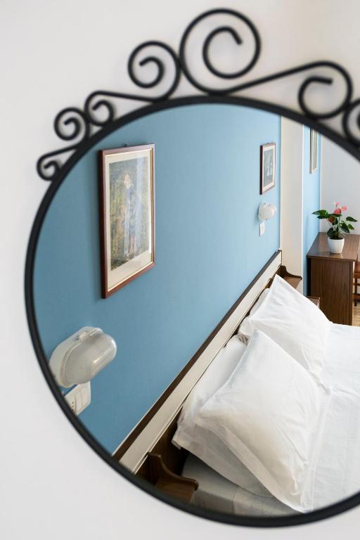 Postel nebo postele na pokoji v ubytování Hotel Cheri