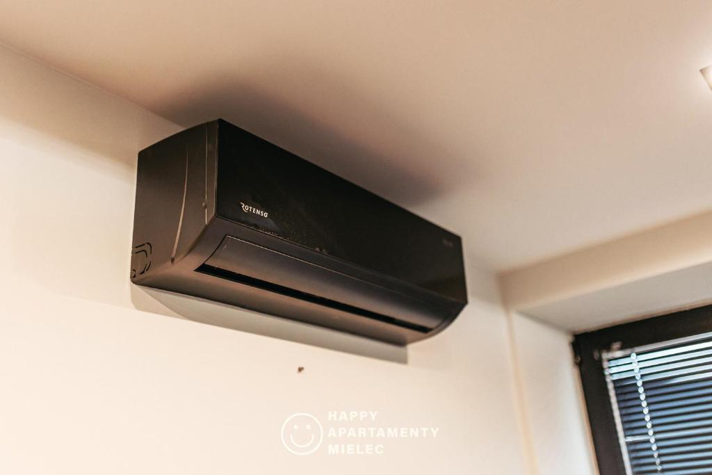 TV a/nebo společenská místnost v ubytování Happy Nest - ApartamentyHappy pl