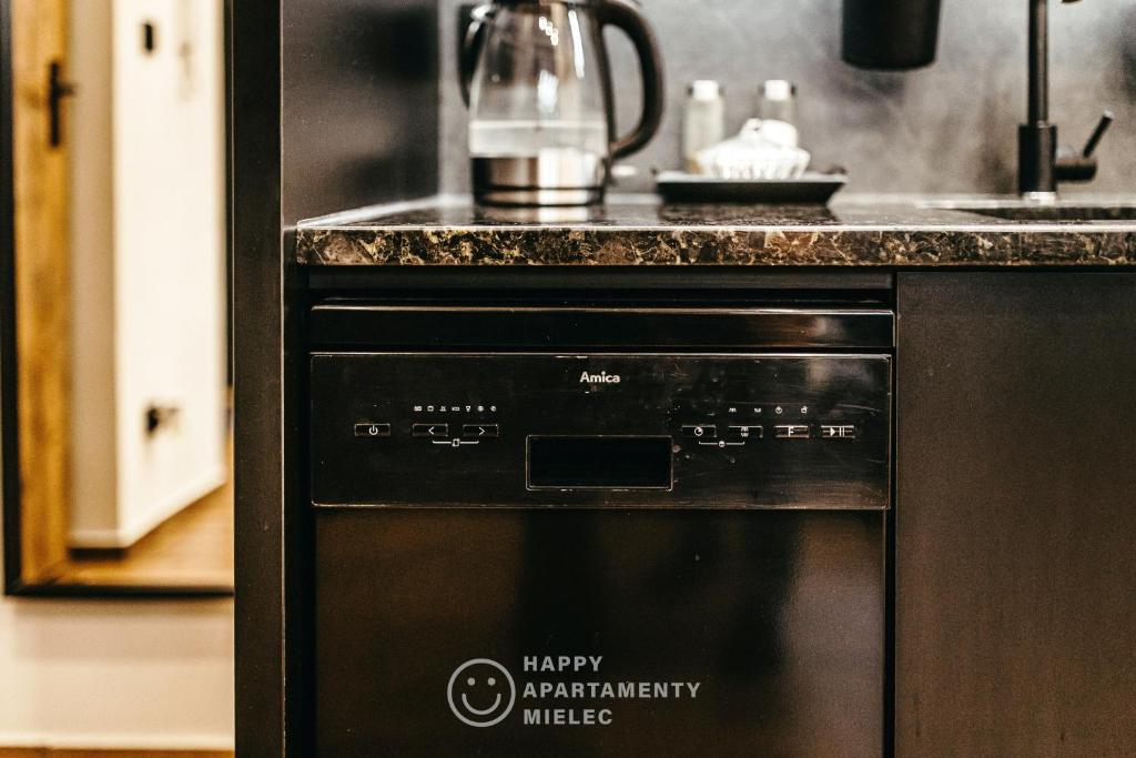 Kuchyň nebo kuchyňský kout v ubytování Happy Nest - ApartamentyHappy pl
