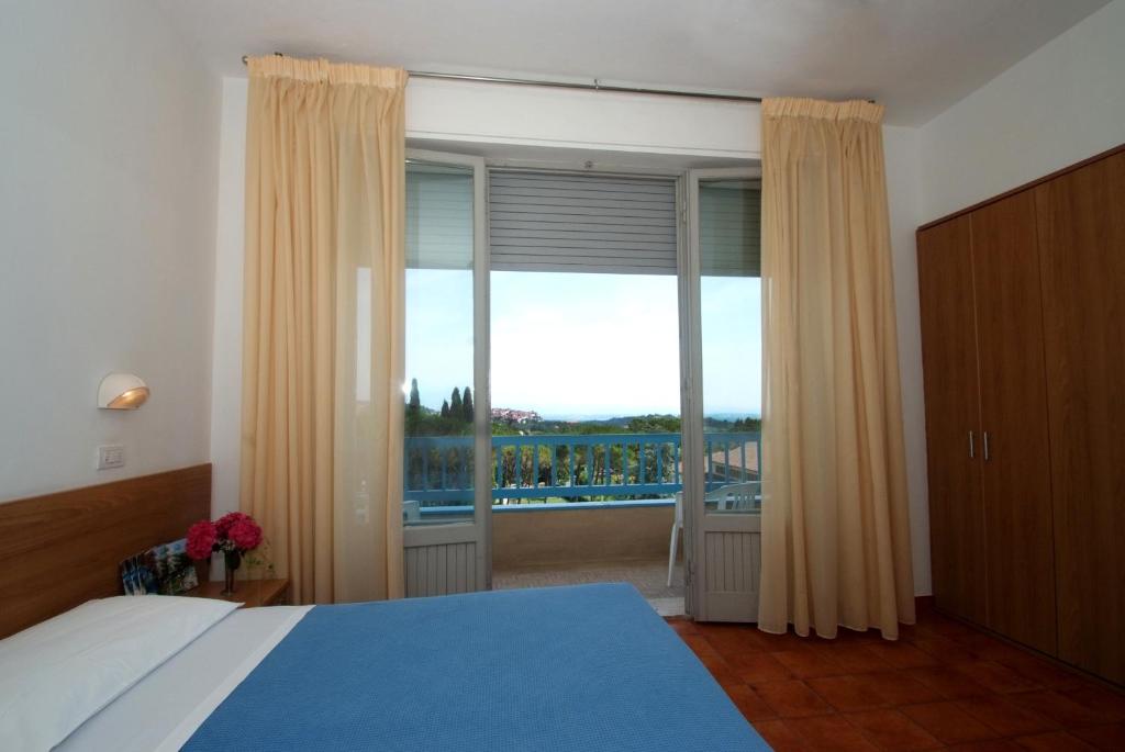 Postel nebo postele na pokoji v ubytování Albergo Le Sorgenti