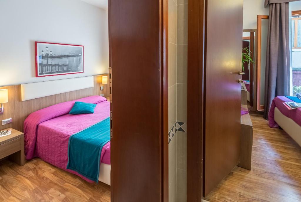 Posteľ alebo postele v izbe v ubytovaní Hotel Il Moro di Venezia