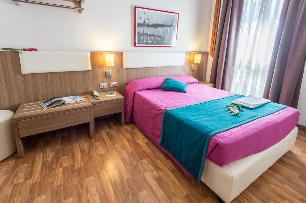 Posteľ alebo postele v izbe v ubytovaní Hotel Il Moro di Venezia