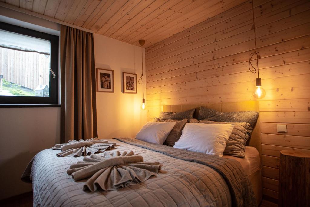 Posteľ alebo postele v izbe v ubytovaní VILLETTA Apartmán