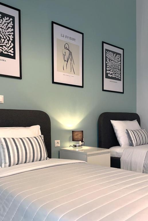 Postel nebo postele na pokoji v ubytování Vasilios Marinos Rooms
