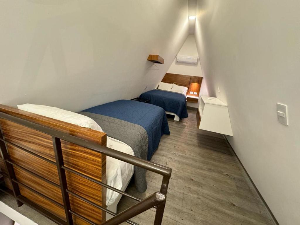 Postel nebo postele na pokoji v ubytování HOTEL ISLA