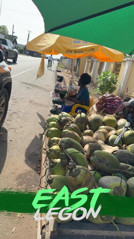 a display of watermelons on the side of the road at Gee guest house in Accra