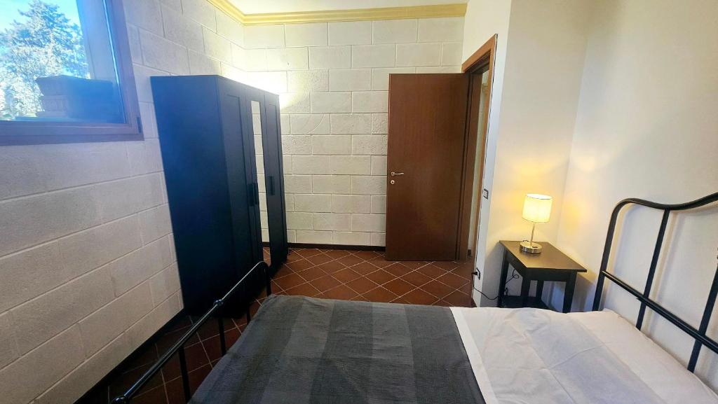 Postel nebo postele na pokoji v ubytování La Pineta