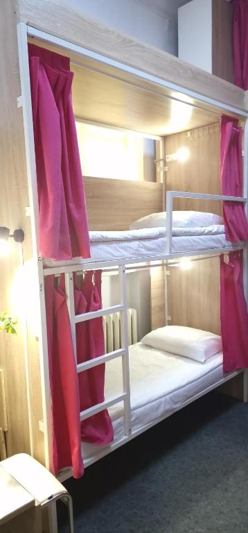 Postel nebo postele na pokoji v ubytování Hostel Capsule
