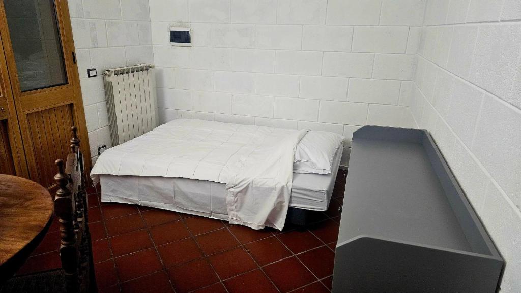 Postel nebo postele na pokoji v ubytování La Pineta