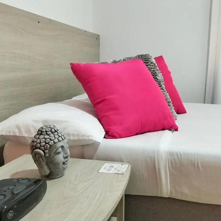 Postel nebo postele na pokoji v ubytování ZIVÁ HOSTAL