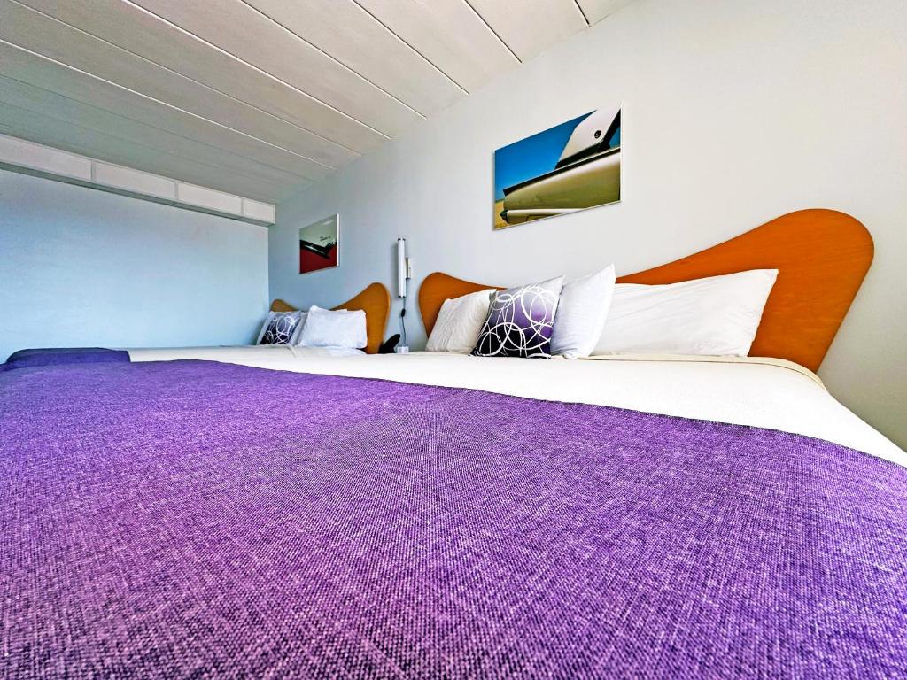 Postel nebo postele na pokoji v ubytování Shalimar Resort