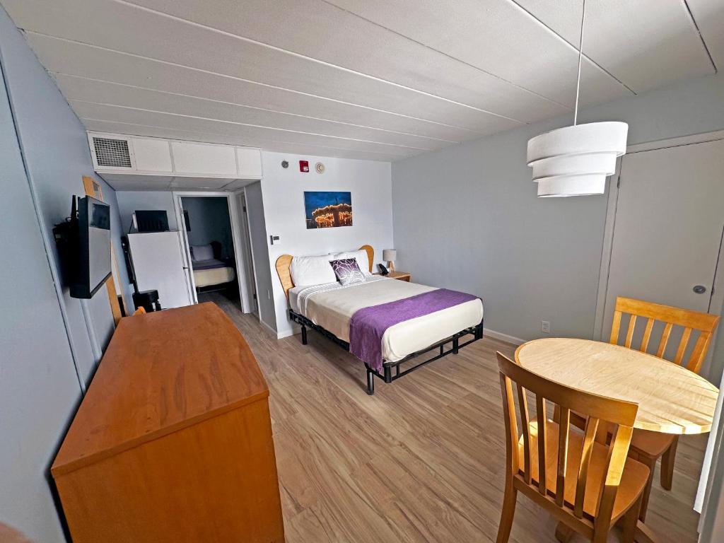 Postel nebo postele na pokoji v ubytování Shalimar Resort