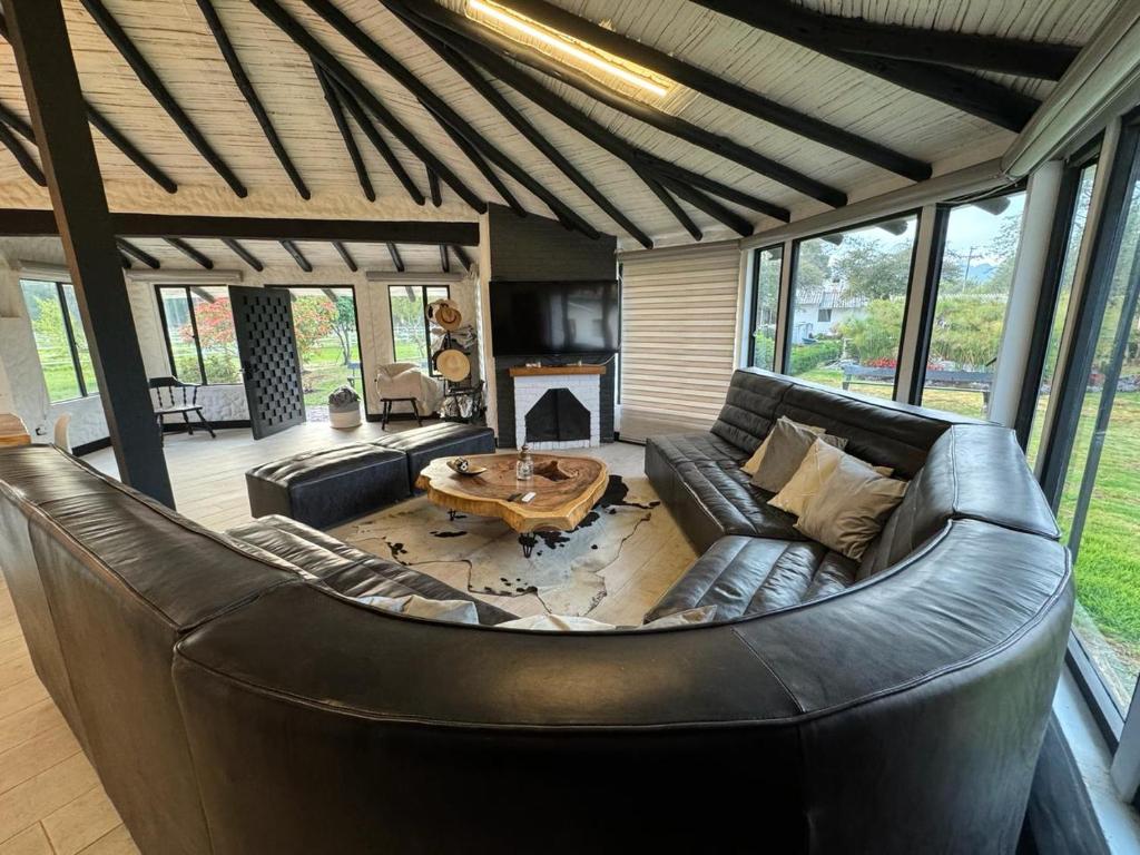 Posezení v ubytování Luxury Finca el Ensueño, casa entera, con Sauna, Jacuzzi, BBQ y Caballos