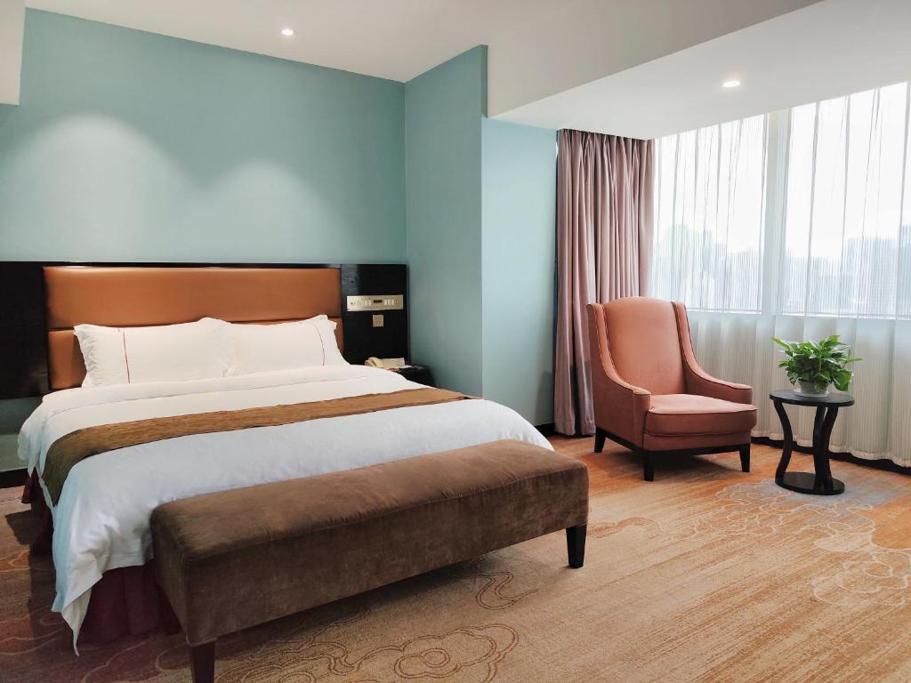 Postel nebo postele na pokoji v ubytování Skyline Plaza Hotel Guangzhou