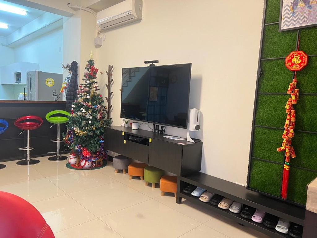 TV a/nebo společenská místnost v ubytování 薇楽民宿