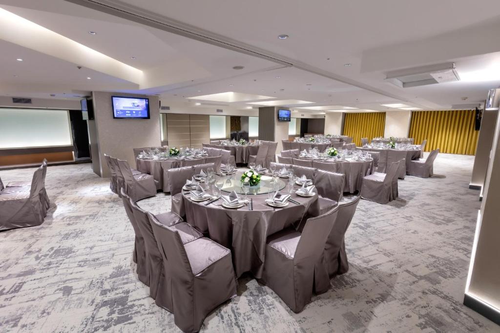 TV a/nebo společenská místnost v ubytování United Hotel