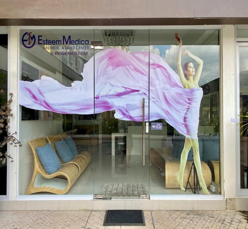 a store window with a mannequin in a dress at CF Haven - Resort Living Condo w/ Balcony at Bamboo Bay in Mandaue City