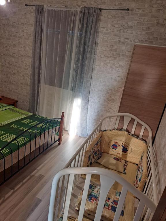 Postel nebo postele na pokoji v ubytování Μονοκατοικία Kathrin