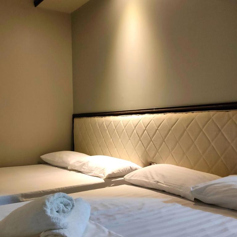 Postel nebo postele na pokoji v ubytování Hotel Snow Angeles